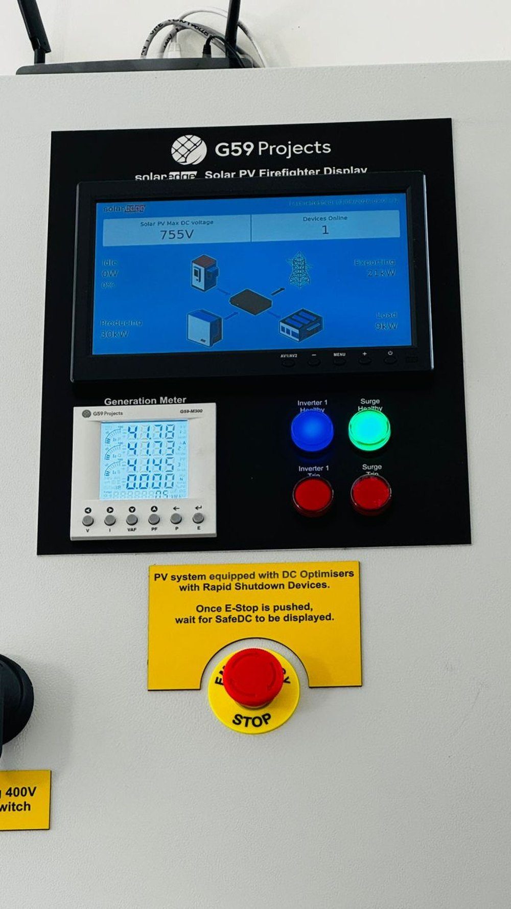 Firefighter display panel showing maximum DC voltage, live generation and export, with generation meter, status indicators and emergency stop