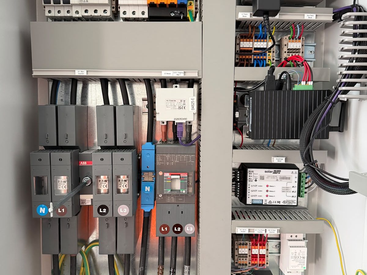 Solvexa engineer maintaining a commercial solar system