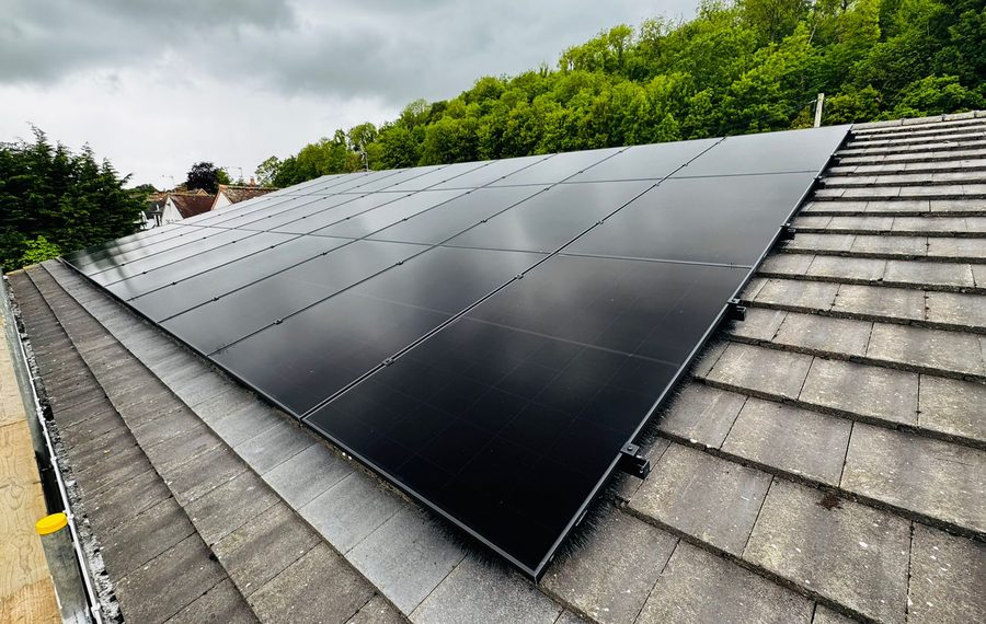 Engineers maintaining solar panels